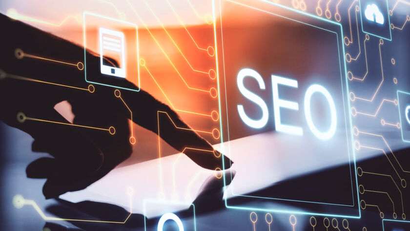 Hands interacting with a digital interface displaying "SEO", symbolizing high performance SEO agency services.